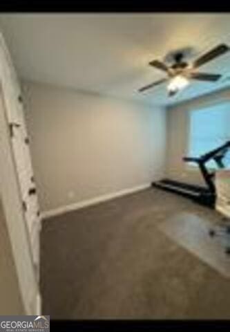 406 Clifton Rd, Perry, GA 31069 - workout area featuring baseboards and carpet flooring