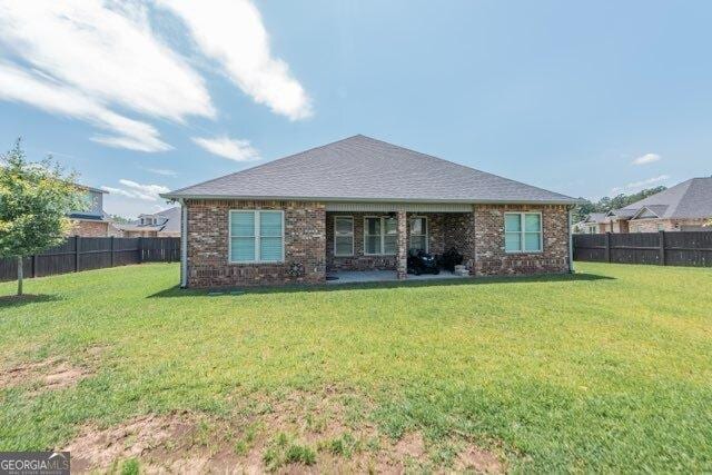 406 Clifton Rd, Perry, GA 31069 - rear view of house with brick siding