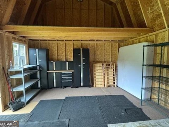 406 Clifton Rd, Perry, GA 31069 - miscellaneous room featuring lofted ceiling and light colored carpet