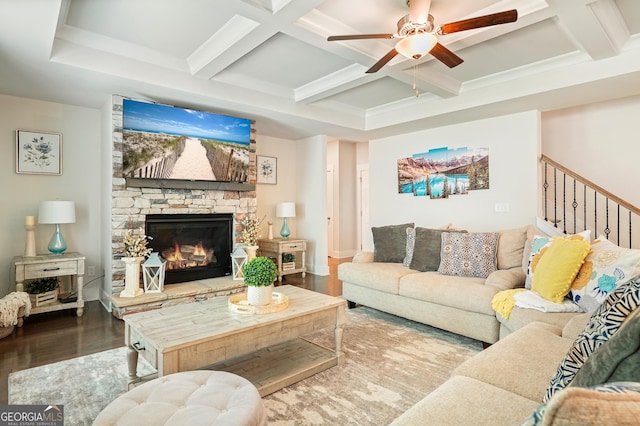 383 Crestbrook Ln, Dallas, GA 30157 - living room featuring coffered ceiling, a ceiling fan, wood finished floors, a fireplace, and beam ceiling