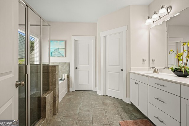 383 Crestbrook Ln, Dallas, GA 30157 - bathroom featuring vanity, a shower stall, and a garden tub