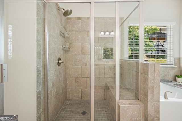 383 Crestbrook Ln, Dallas, GA 30157 - bathroom with a stall shower and a bath