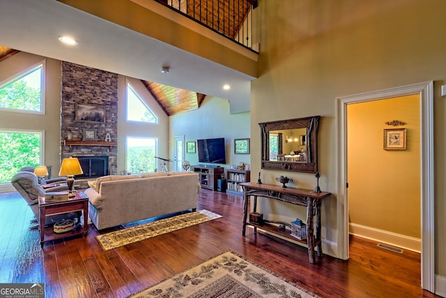 421 Hickory Nut Mountain Rd, Tallulah Falls, GA 30573 - living area featuring high vaulted ceiling, hardwood / wood-style flooring, and a fireplace