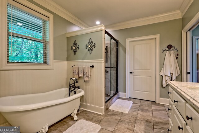 421 Hickory Nut Mountain Rd, Tallulah Falls, GA 30573 - full bathroom featuring a freestanding tub, a shower stall, vanity, crown molding, and wainscoting