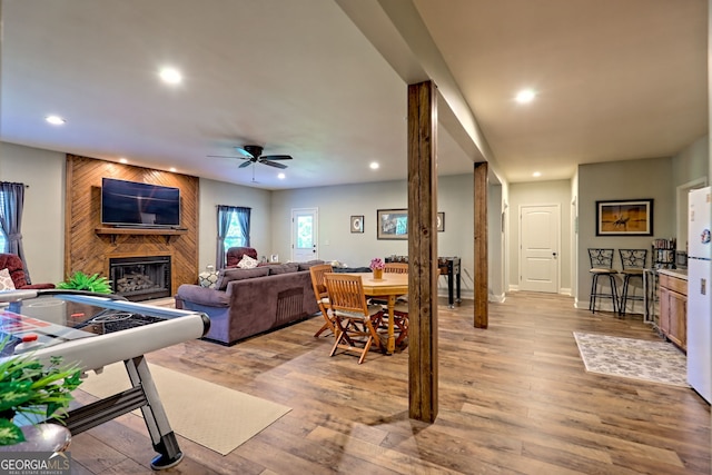 421 Hickory Nut Mountain Rd, Tallulah Falls, GA 30573 - living room with recessed lighting, ceiling fan, a large fireplace, and light wood-type flooring
