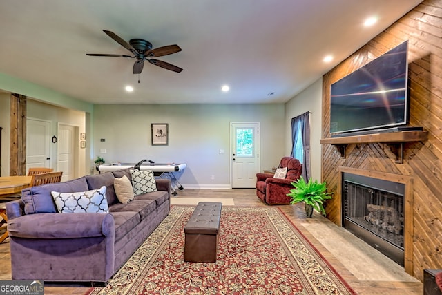 421 Hickory Nut Mountain Rd, Tallulah Falls, GA 30573 - living room featuring recessed lighting, a fireplace, ceiling fan, and wood finished floors