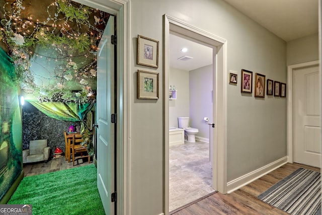 421 Hickory Nut Mountain Rd, Tallulah Falls, GA 30573 - hall with wood finished floors and baseboards