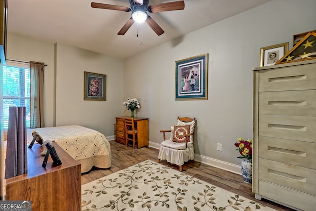 421 Hickory Nut Mountain Rd, Tallulah Falls, GA 30573 - bedroom with wood finished floors and ceiling fan