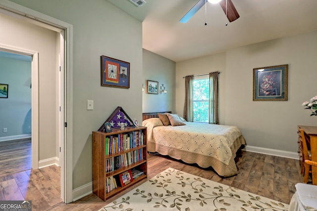 421 Hickory Nut Mountain Rd, Tallulah Falls, GA 30573 - bedroom with hardwood / wood-style floors and ceiling fan