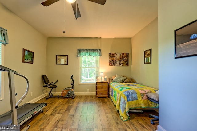 421 Hickory Nut Mountain Rd, Tallulah Falls, GA 30573 - bedroom with wood-type flooring and ceiling fan