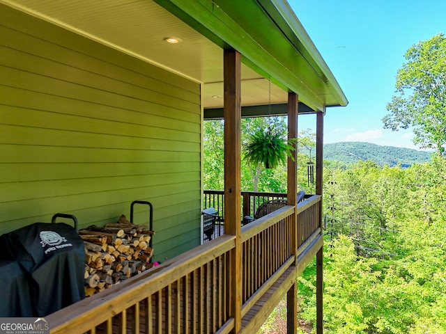 421 Hickory Nut Mountain Rd, Tallulah Falls, GA 30573 - wooden terrace featuring a wooded view
