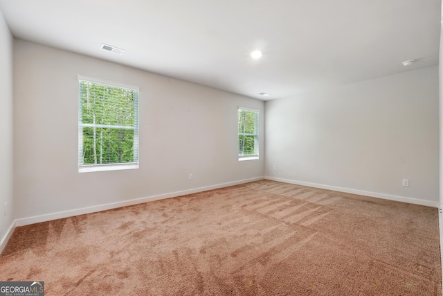 768 Great Oak Pl Unit 26, Villa Rica, GA 30180 - carpeted empty room with healthy amount of natural light and baseboards