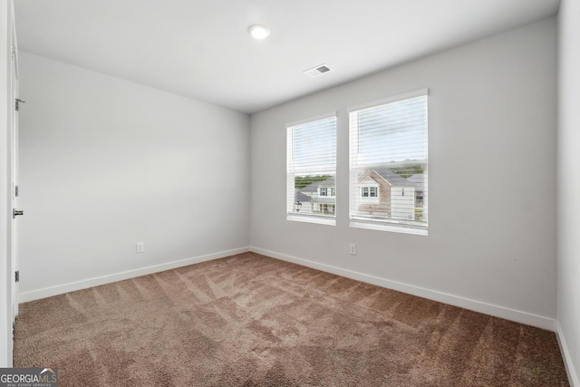 768 Great Oak Pl Unit 26, Villa Rica, GA 30180 - carpeted spare room with baseboards