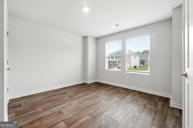 768 Great Oak Pl Unit 26, Villa Rica, GA 30180 - spare room featuring wood finished floors and baseboards