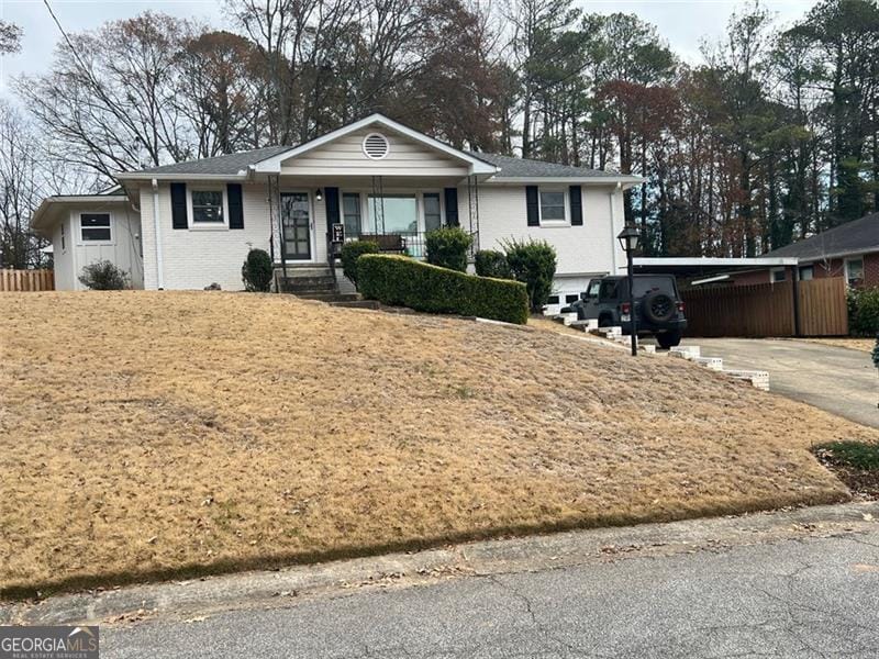 3215 Woodview, Smyrna, GA 30082 - ranch-style home with concrete driveway and brick siding