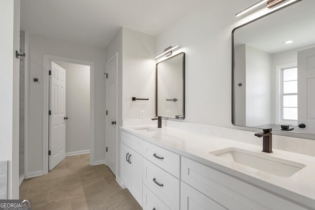 5523 River Valley Way, Flowery Branch, GA 30542 - bathroom featuring double vanity