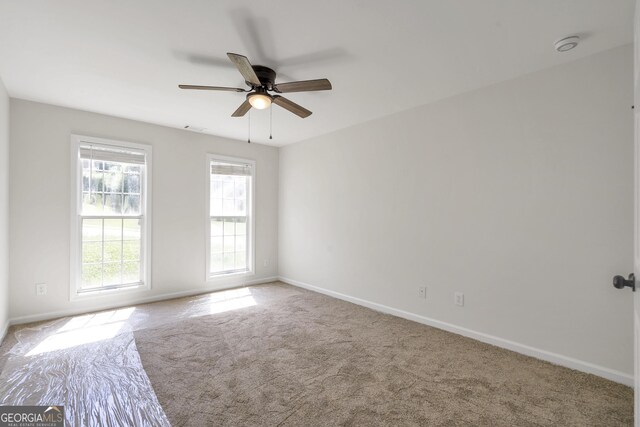 5523 River Valley Way, Flowery Branch, GA 30542 - unfurnished room featuring a ceiling fan, carpet flooring, baseboards, and a smoke detector