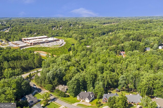 5523 River Valley Way, Flowery Branch, GA 30542 - aerial overview of property's location featuring a heavily wooded area
