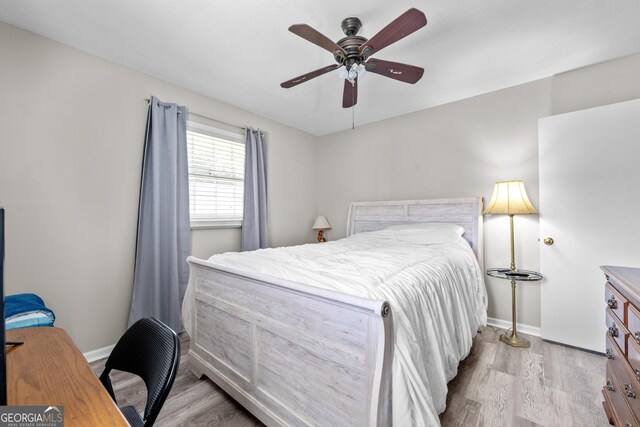 1322 Melford Dr, Columbus, GA 31907 - bedroom with wood finished floors, baseboards, and a ceiling fan