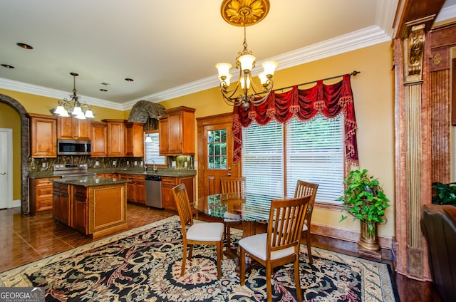 2120 Shaffer Rd, Cumming, GA 30041 - dining room with a chandelier, ornamental molding, and dark tile patterned floors