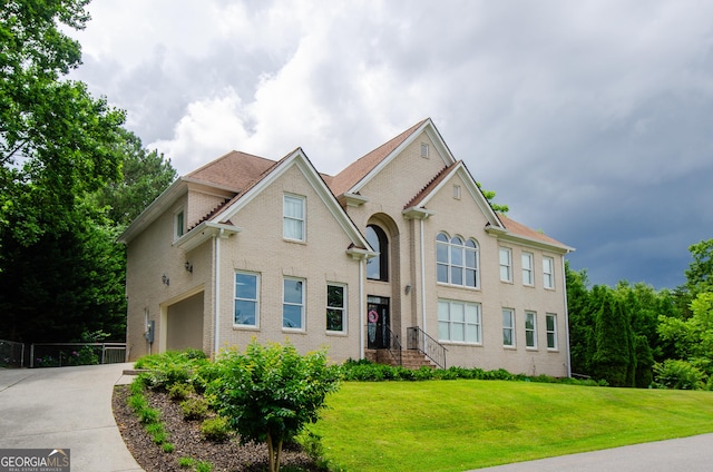 2120 Shaffer Rd, Cumming, GA 30041 - view of front of house with concrete driveway, a front lawn, and an attached garage