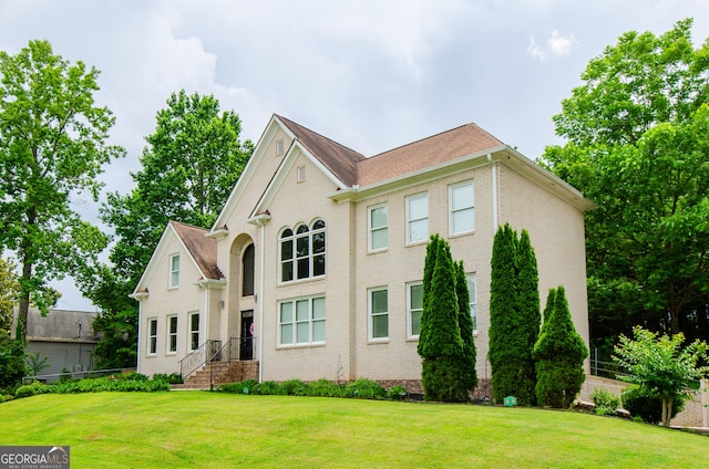 2120 Shaffer Rd, Cumming, GA 30041 - view of front of home featuring a front yard and brick siding