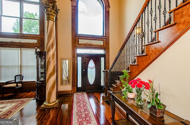 2120 Shaffer Rd, Cumming, GA 30041 - foyer entrance featuring plenty of natural light, a towering ceiling, stairway, and hardwood / wood-style floors