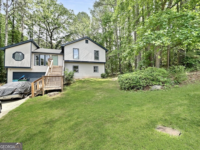 2816 Quinbery Dr, Snellville, GA 30039 - back of property with a lawn and stairs