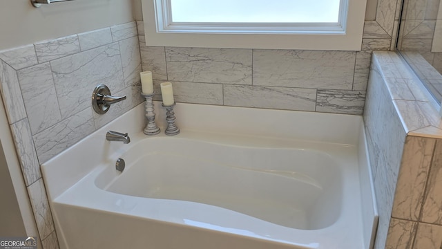 2321 Margaux Ct, Monroe, GA 30656 - bathroom featuring plenty of natural light and a garden tub