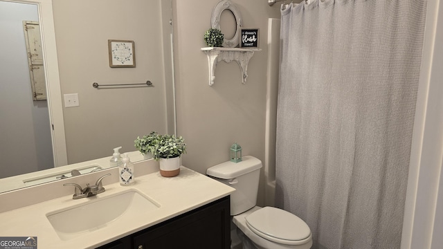 2321 Margaux Ct, Monroe, GA 30656 - full bathroom with vanity, toilet, and a shower with curtain