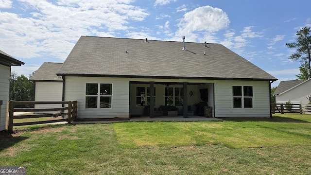 2321 Margaux Ct, Monroe, GA 30656 - rear view of house with a patio, a shingled roof, and an outdoor hangout area