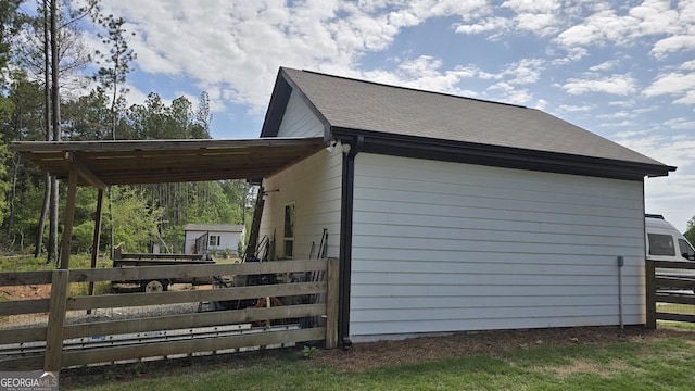 2321 Margaux Ct, Monroe, GA 30656 - view of side of home featuring an attached carport
