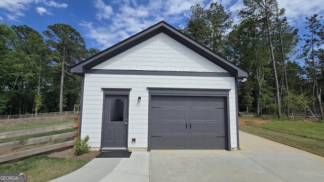 2321 Margaux Ct, Monroe, GA 30656 - garage featuring concrete driveway