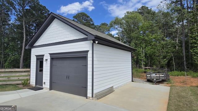 2321 Margaux Ct, Monroe, GA 30656 - detached garage featuring driveway