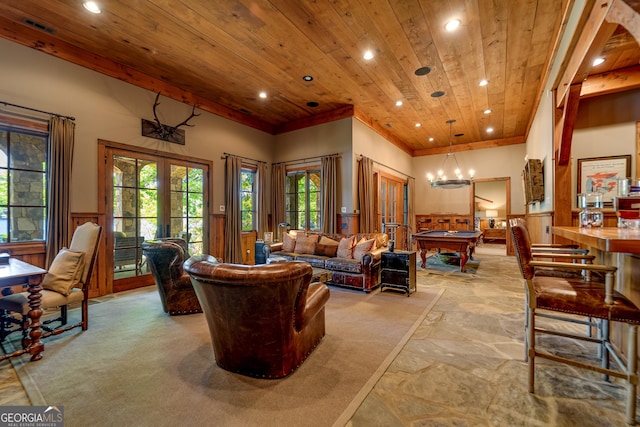 4334 Murray Cove Rd, Tiger, GA 30576 - living room featuring recessed lighting, pool table, wooden ceiling, a wainscoted wall, and stone finish floors