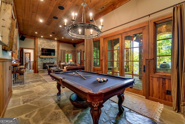 4334 Murray Cove Rd, Tiger, GA 30576 - recreation room with wood ceiling, stone floors, plenty of natural light, recessed lighting, and a stone fireplace