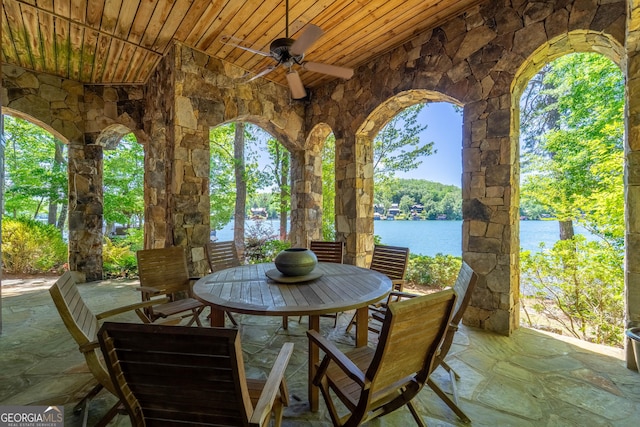 4334 Murray Cove Rd, Tiger, GA 30576 - view of patio / terrace featuring a ceiling fan, outdoor dining area, and a water view
