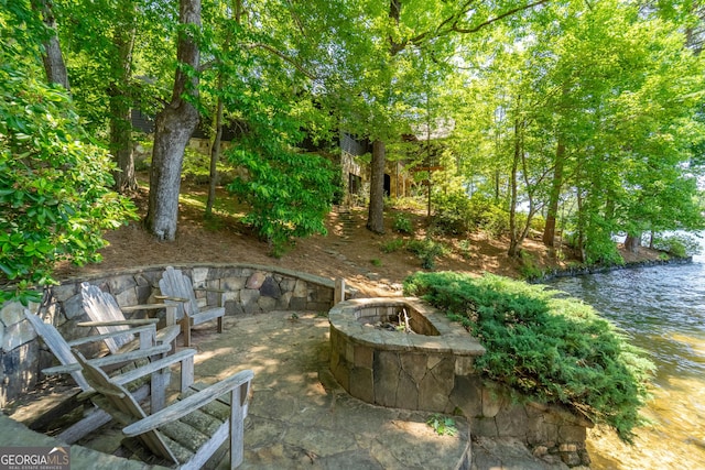4334 Murray Cove Rd, Tiger, GA 30576 - view of patio / terrace with an outdoor fire pit and a water view