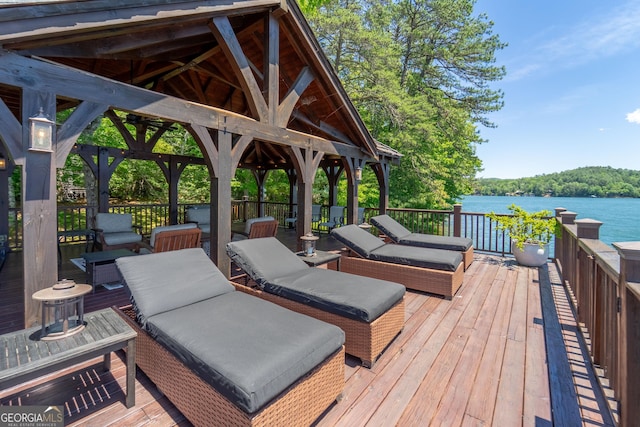 4334 Murray Cove Rd, Tiger, GA 30576 - wooden deck with a gazebo, a water view, and an outdoor hangout area