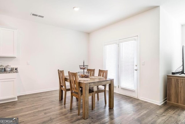115 Taylor Woods Ct, Bonaire, GA 31005 - dining room featuring dark wood-type flooring and baseboards
