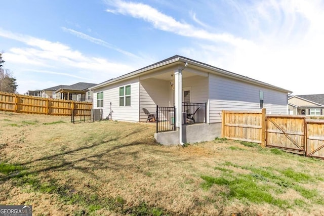 115 Taylor Woods Ct, Bonaire, GA 31005 - back of property featuring cooling unit