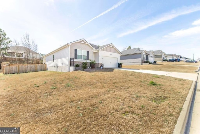 115 Taylor Woods Ct, Bonaire, GA 31005 - craftsman house with concrete driveway and an attached garage