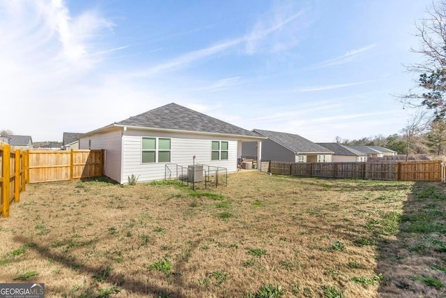 115 Taylor Woods Ct, Bonaire, GA 31005 - rear view of property featuring cooling unit and a shingled roof