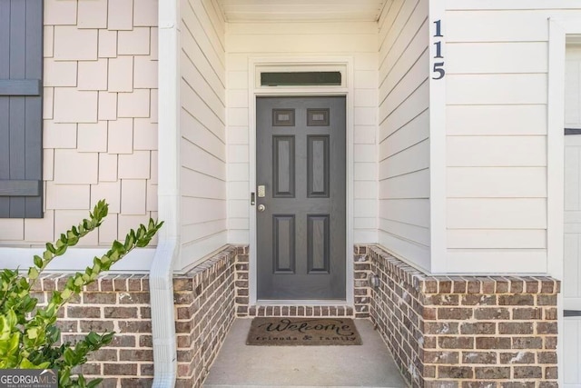 115 Taylor Woods Ct, Bonaire, GA 31005 - doorway to property with covered porch