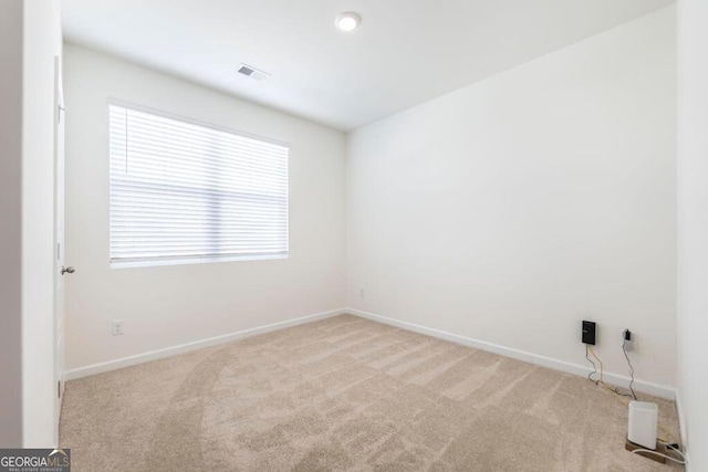 115 Taylor Woods Ct, Bonaire, GA 31005 - unfurnished room featuring light colored carpet and baseboards