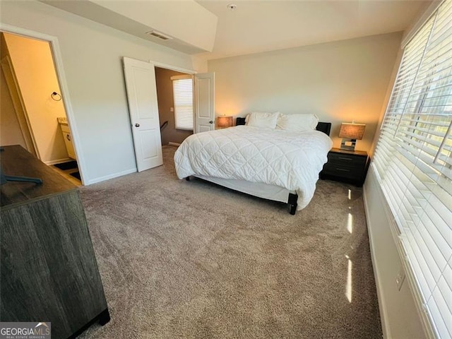 3615 Hawthorne Ter, Atlanta, GA 30337 - carpeted bedroom featuring baseboards and vaulted ceiling