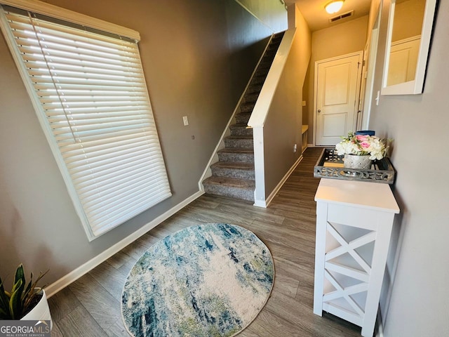 3615 Hawthorne Ter, Atlanta, GA 30337 - stairs featuring baseboards and wood finished floors