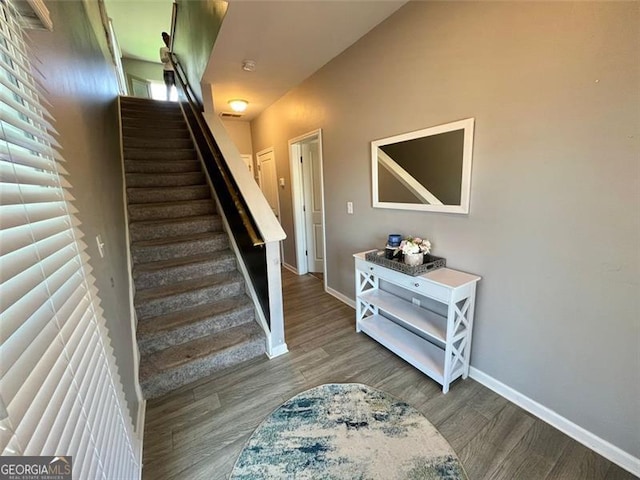3615 Hawthorne Ter, Atlanta, GA 30337 - staircase featuring wood finished floors and baseboards