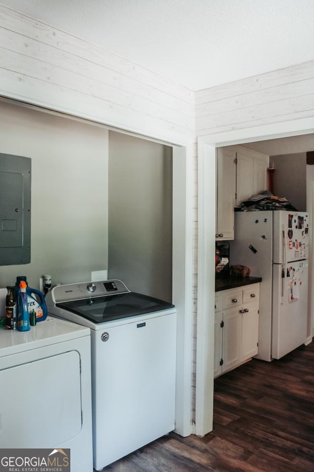 175 Briarwood Cir, Americus, GA 31709 - washroom featuring washer and clothes dryer, electric panel, and dark wood finished floors