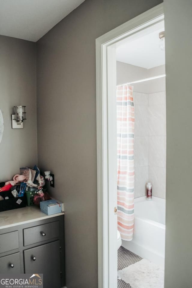 175 Briarwood Cir, Americus, GA 31709 - bathroom with toilet, shower / bath combo with shower curtain, tile patterned flooring, and vanity